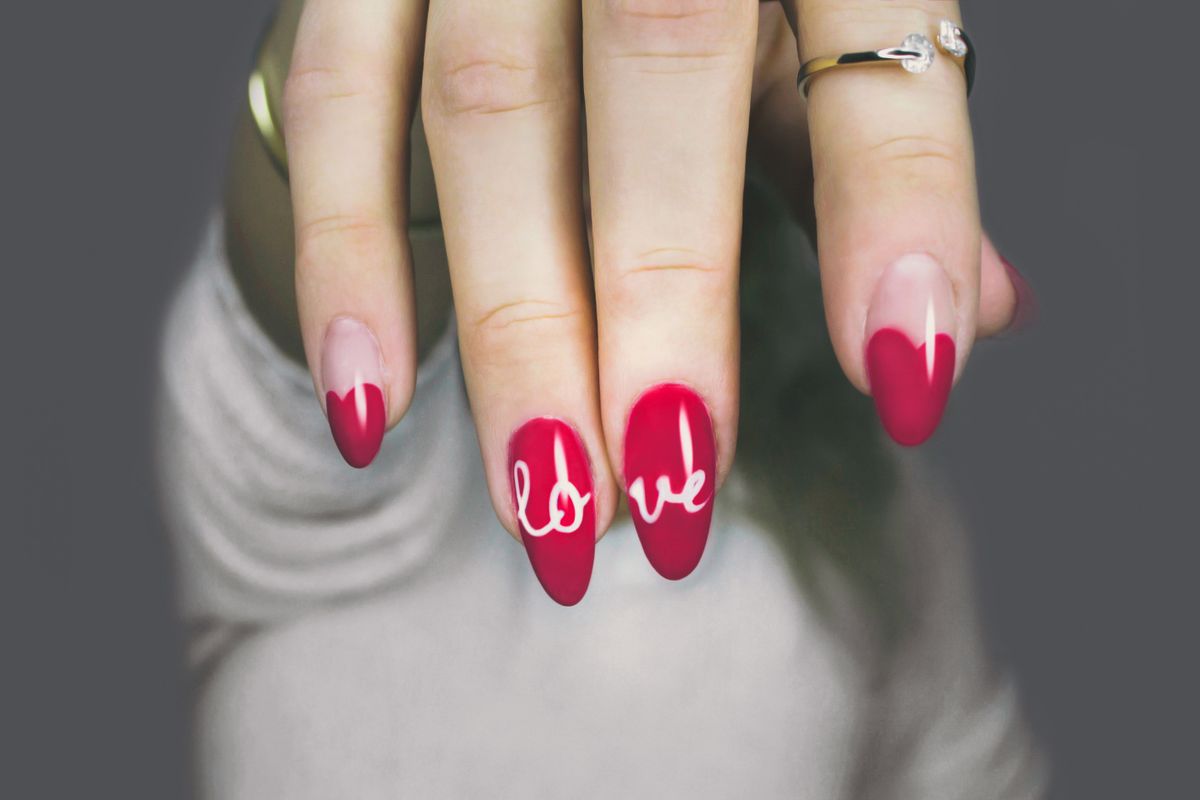 Bold red nail art set, the style of work at Neecie Nails It